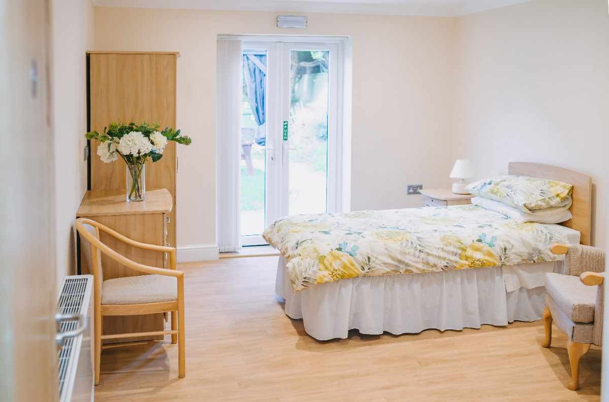 Comfortable bedroom at Tŷ Hafod care home Cardiff
